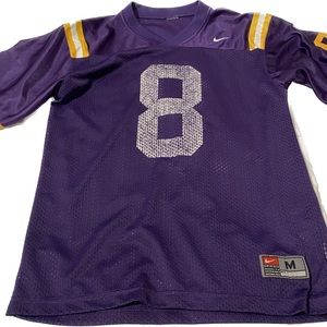 Youth XL or women’s XS Nike jersey purple and yellow